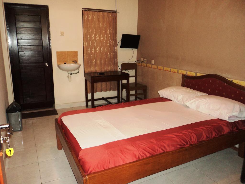Hotel Sentral Pabean Buleleng Kamer foto