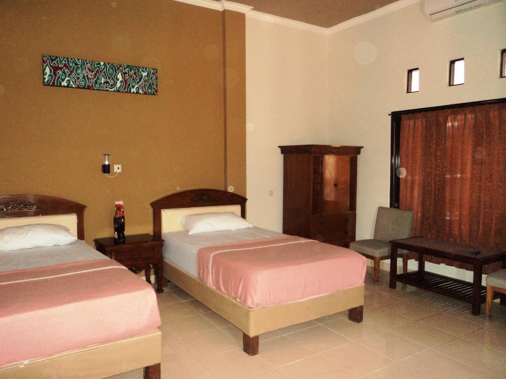Hotel Sentral Pabean Buleleng Kamer foto